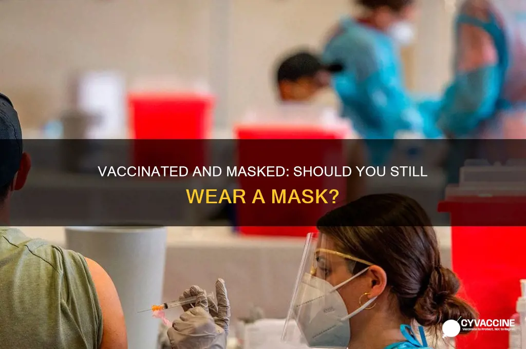 should i keep wearing my mask if im vaccinated