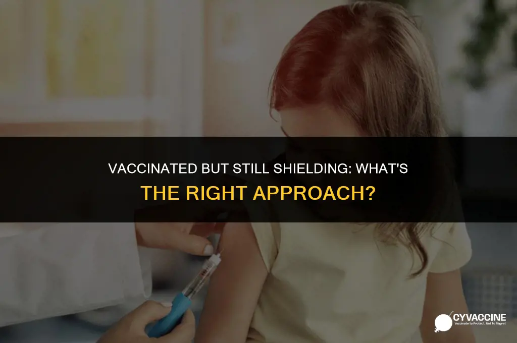 should i still shield after vaccination